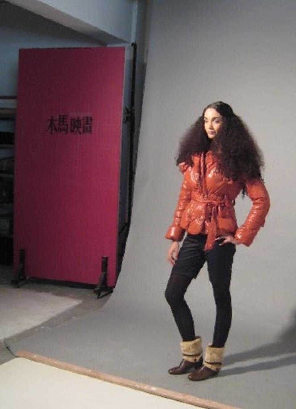 A photo shoot featuring a model who was styled by Faye Wu