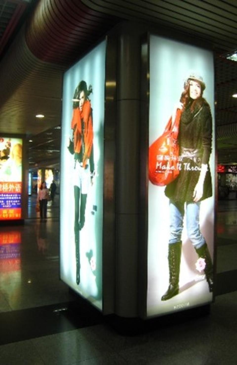 Billboards featuring outfits that were styled by Faye Wu