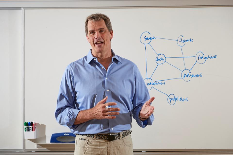 Professor Andrew Hargadon teaching in front of a white board
