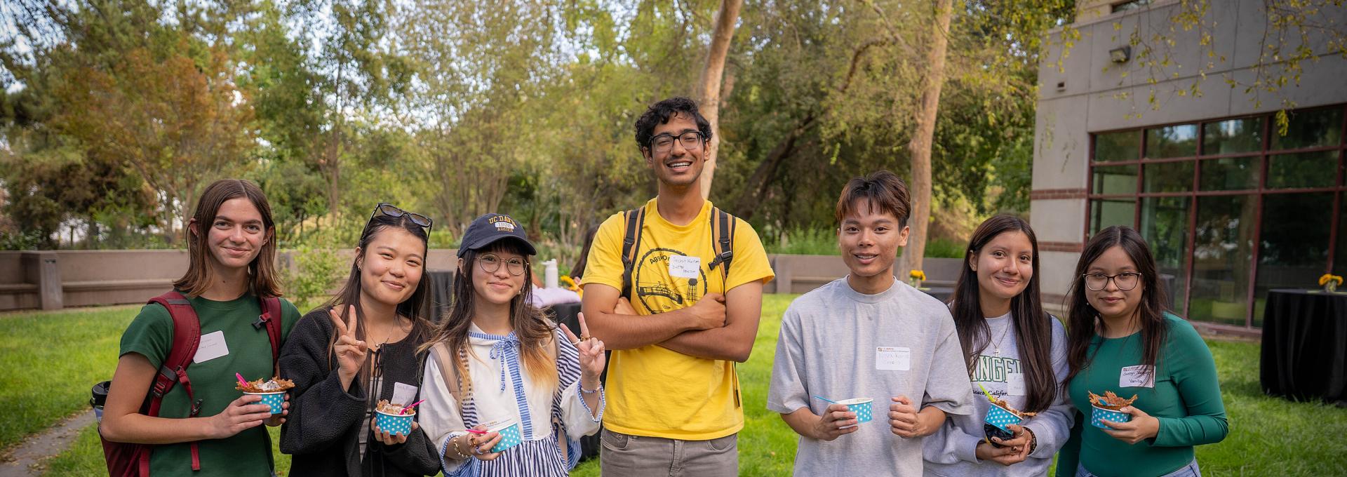 Business major students at an event on campus