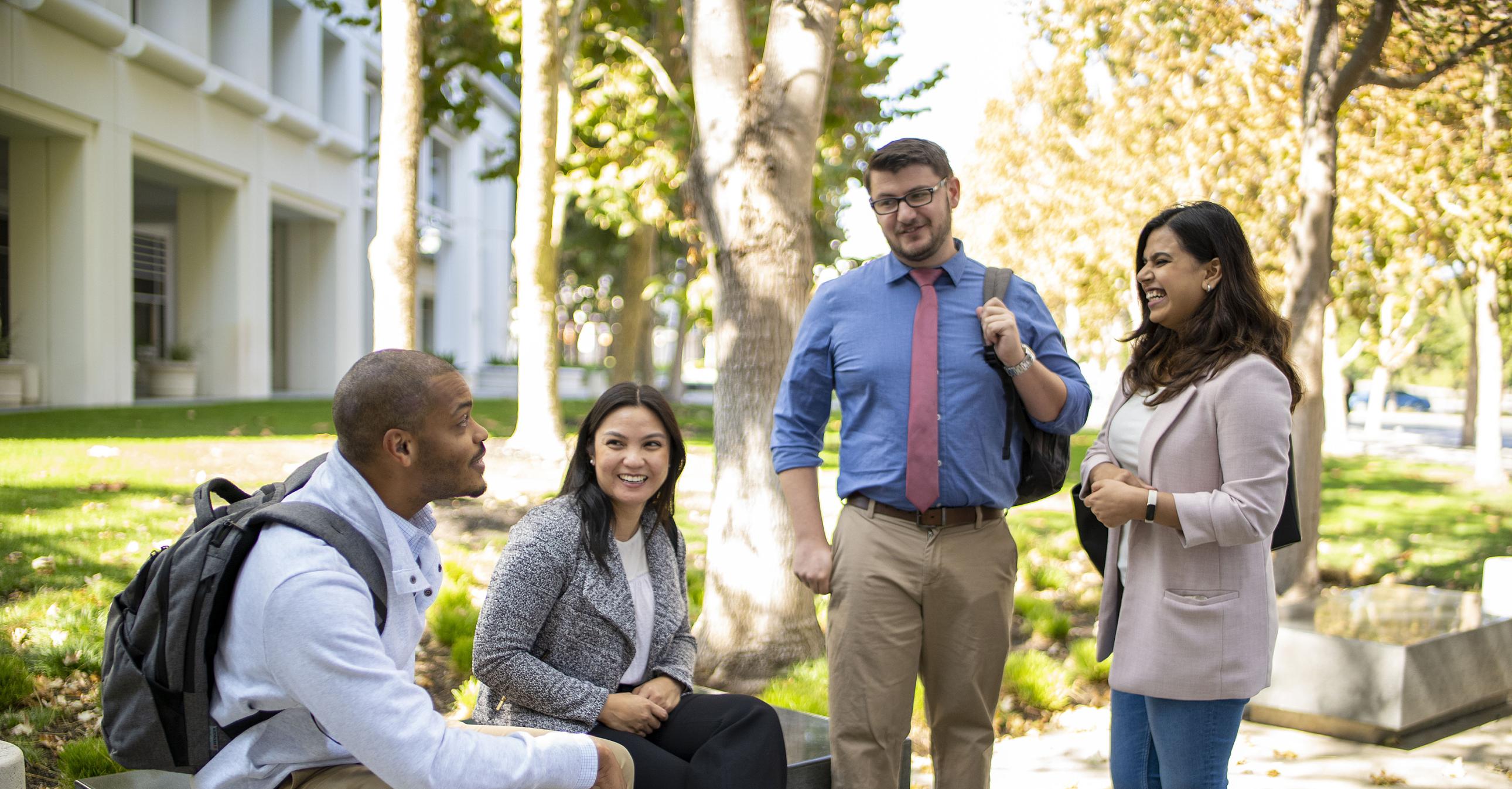Four Bay Area Part-Time MBA students at the San Ramon campus