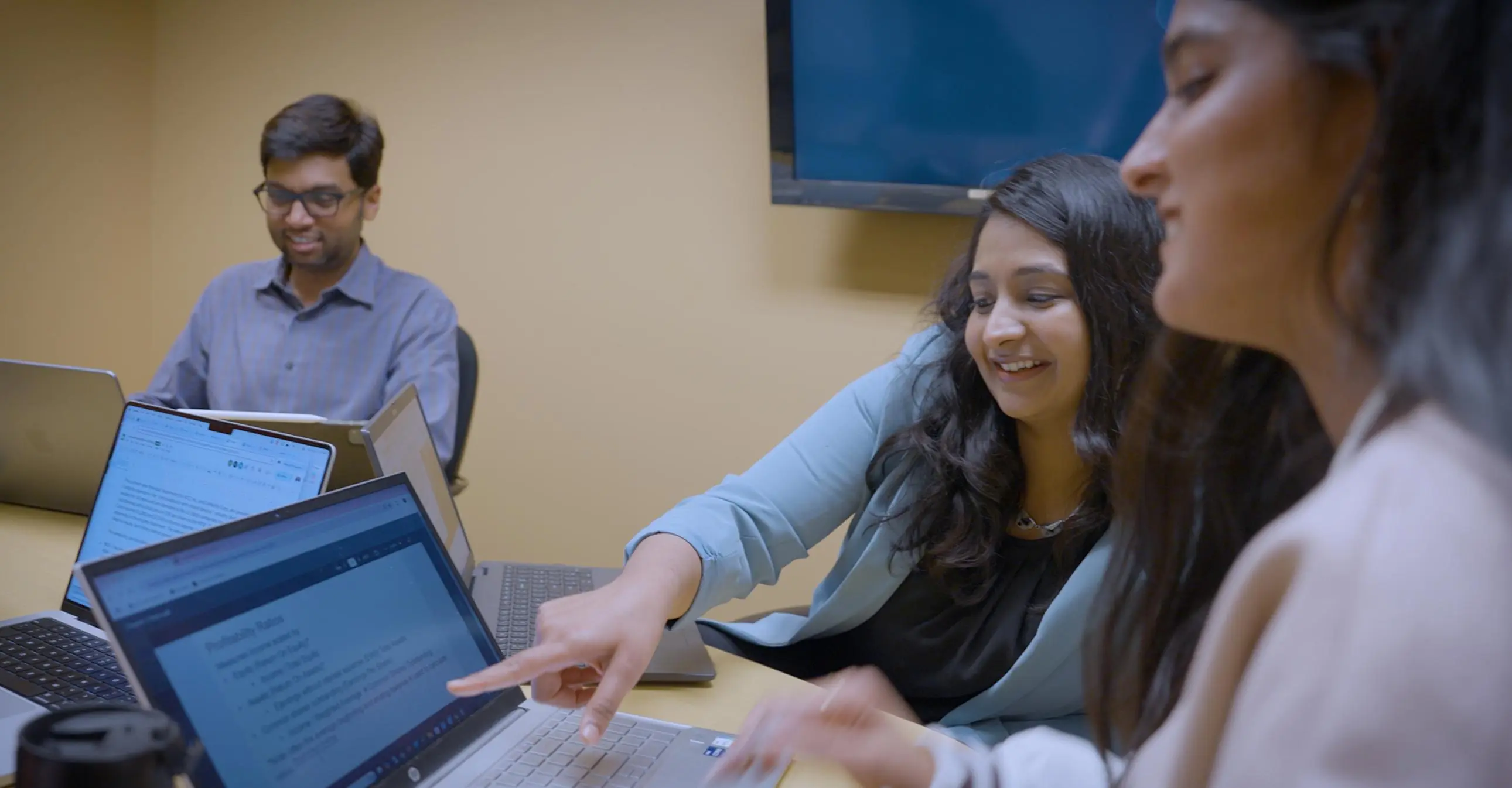 Bay Area Part-Time MBA students working on a laptop