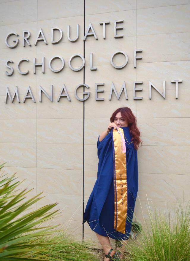 2022 MPAc graduate Brianna Dean-Sysum in front of Gallagher Hall