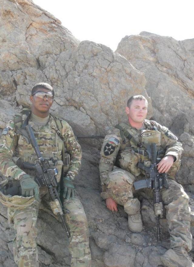 Staff Sergeant Ryan Wilson with his platoon, the Combined Task Force Arrowhead Personal Security Detachment, in Panjwai, Afghanistan, in 2012.