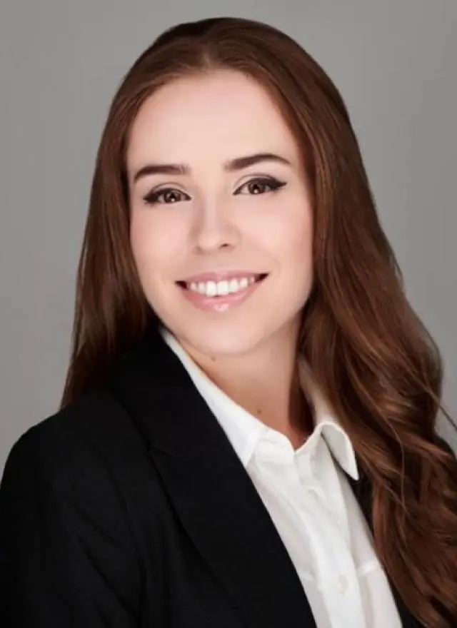 Woman smiling in professional attire
