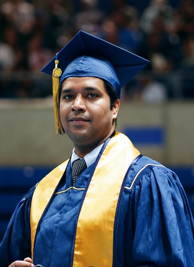 Abhinav Kishore in a cap and gown