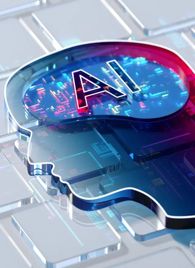 Image of AI emblazoned on brain overlaying keyboard