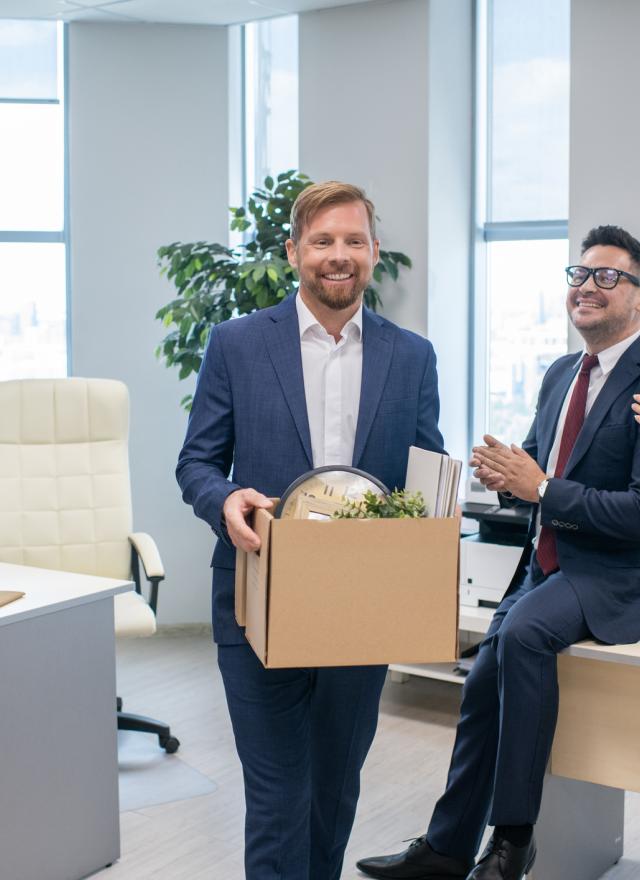 Boomerang employee returns to workplace with box