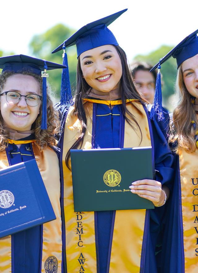 Four graduates at the GSM 2025 commencement ceremony