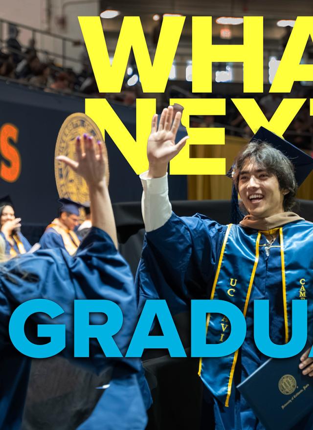 Two UC Davis graduates in caps and gowns high-five at a commencement ceremony. Large text reads "WHAT'S NEXT? GSM GRADUATES.