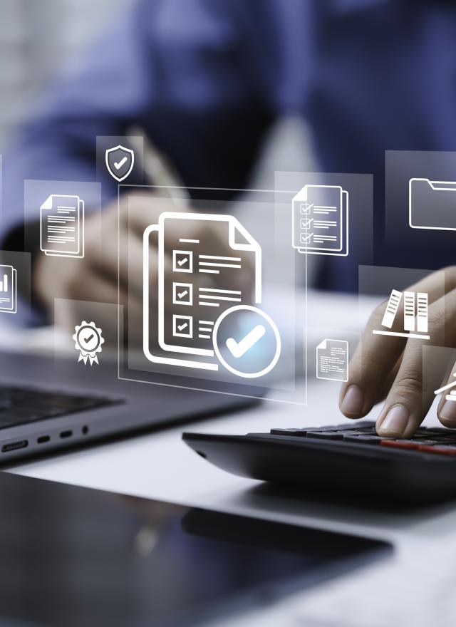 Person using a calculator and laptop at a desk, with digital icons for documents, analytics, and data management overlaid on the image.