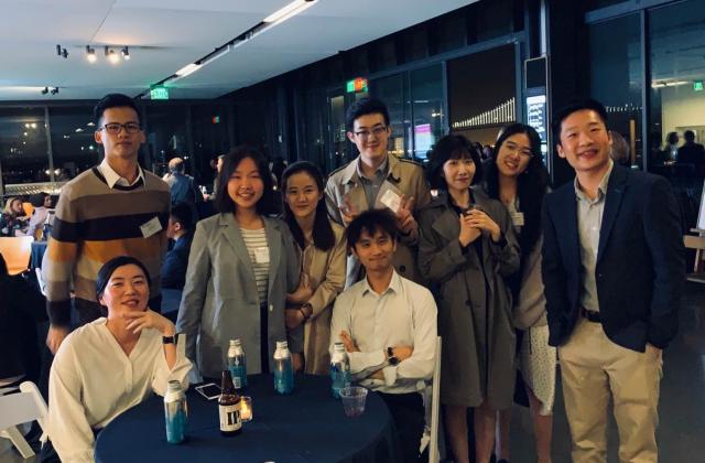 Maxine Li and Michael Chen join other MSBA students at a mixer