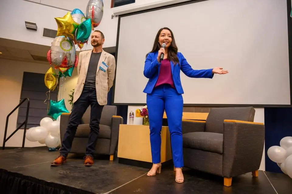 Samantha Contreras speaks to the standing-room-only crowd at the 20th annual Big Bang! Business Competition Launch