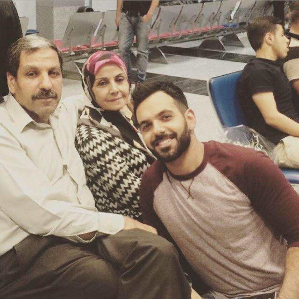 Ali Khaleel Ali and his parents at the airport