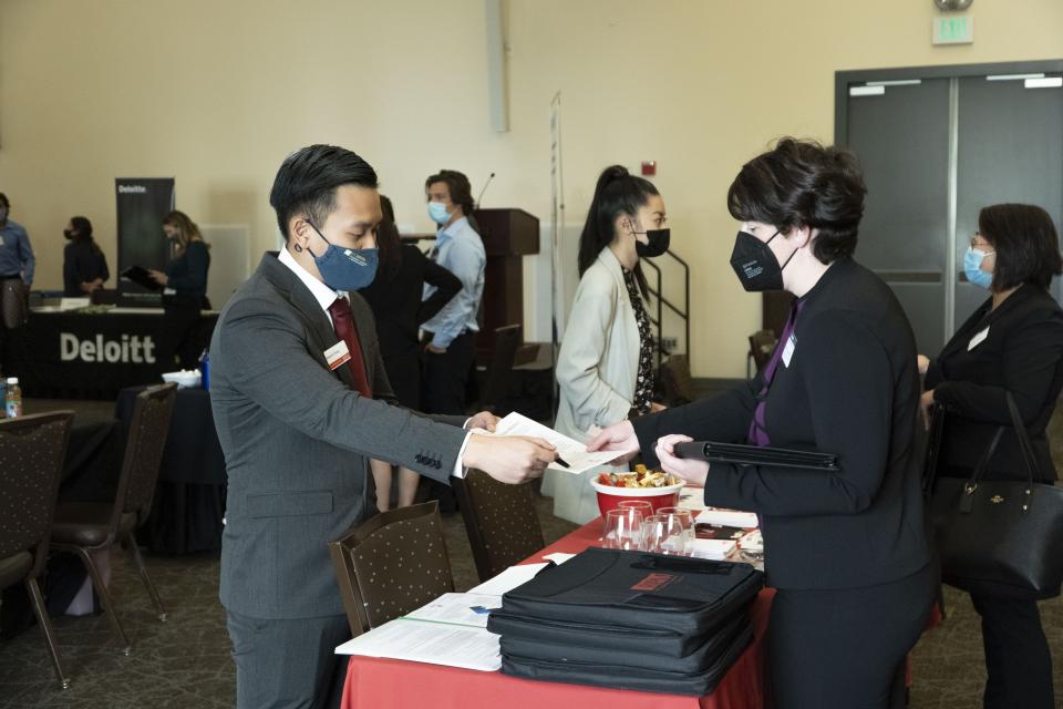 An MPAc student meets with a representative at Meet the Firms