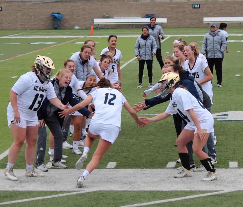 Kate Graham and the UC Davis womens lacrosse team