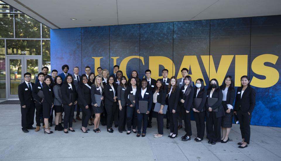 Group of MPAc students in from of UC Davis Welcome Center