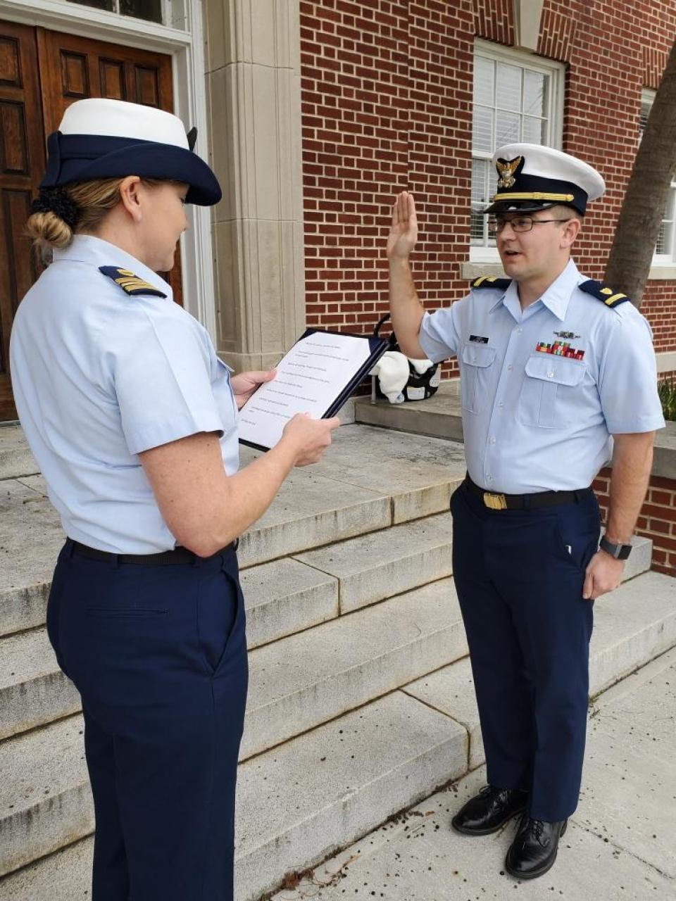 U.S. Coast Guard member being sworn in