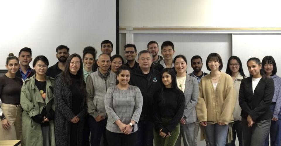 MBA students with Alum Larry Liu in classroom