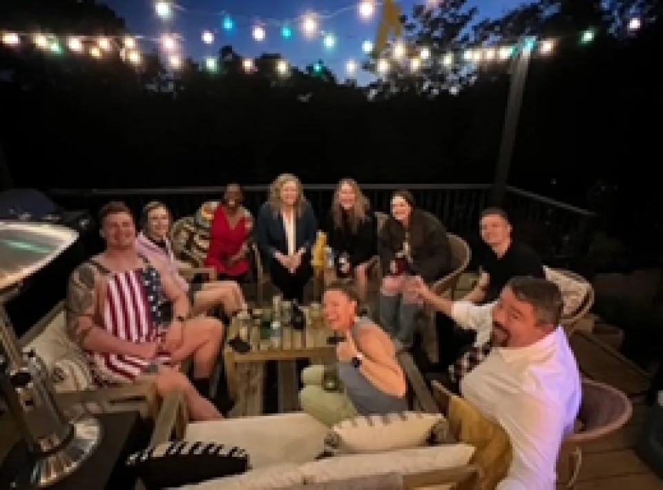 students gathered in a patio 
