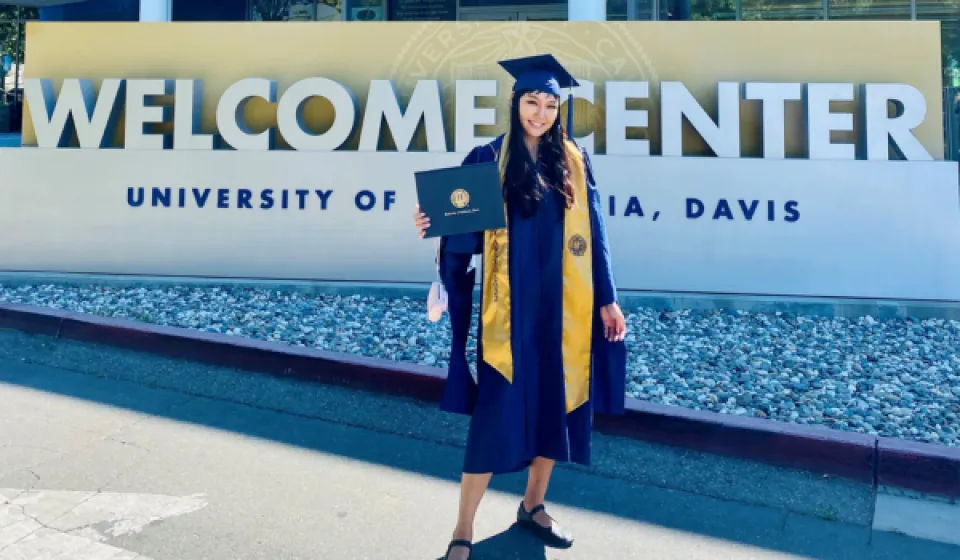 Sodontuya Nerguidavaa standing in front of UC Davis Welcome Center
