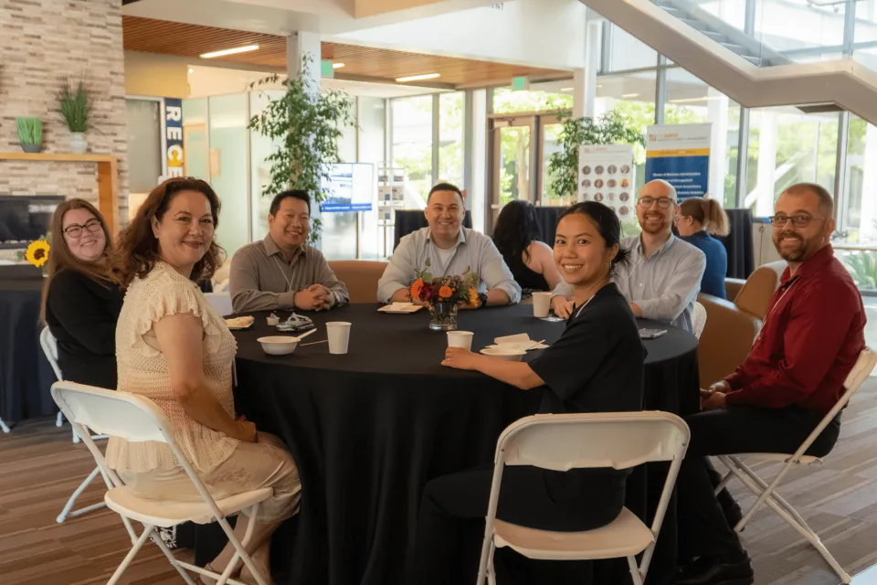 2025 leadership academy participants sitting at table