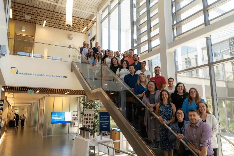 Group photo of 2025 leadership academy participants on staircase