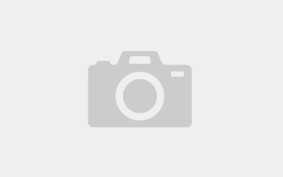 Placeholder image showing a gray camera icon centered on a light gray background, typically used when an actual image is unavailable.