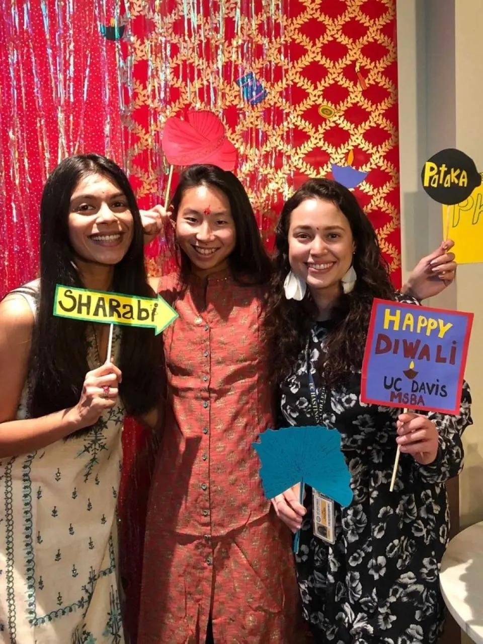 Nandini Bhasu, Allyson Tsuji and Ana Parra Vera at the GSM's Diwali celebration