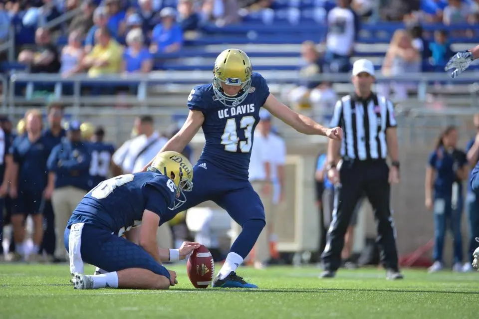 Max O'Rourke about to kick a football