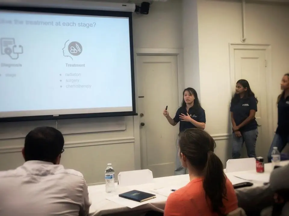 Hackathon team doing a presentation