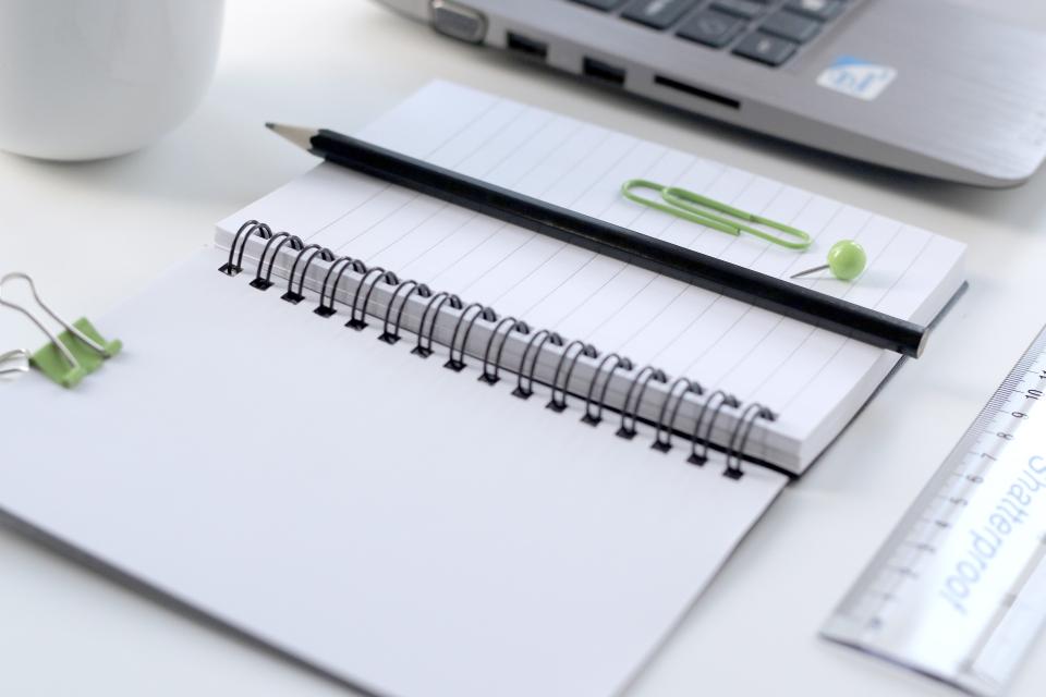 notepad with pen