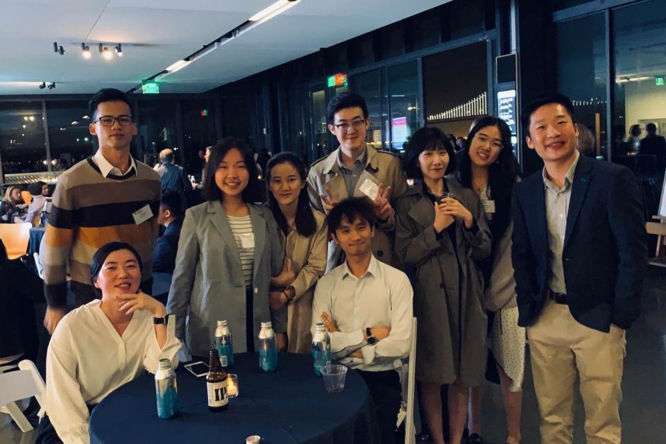 Maxine Li and Michael Chen join other MSBA students at a mixer