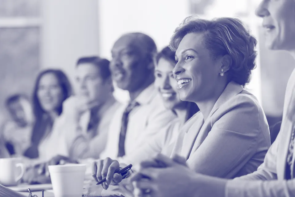 Group of people at a conference table