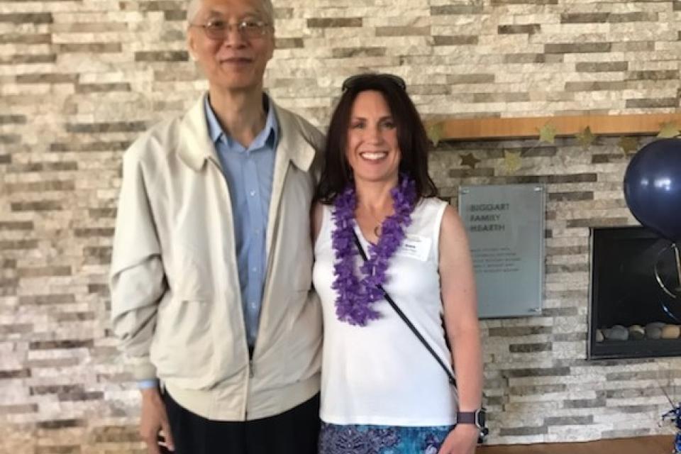Tracy Regis MBA 14 and Professor Tsai at GSM Reunion