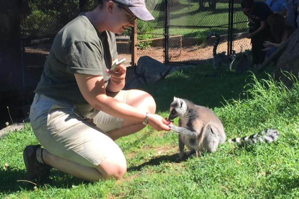 Meagan Travlos MBA 22 and a lemur