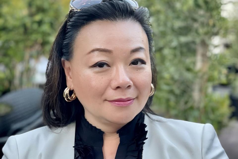 Headshot of Juanita Dion-Chiang