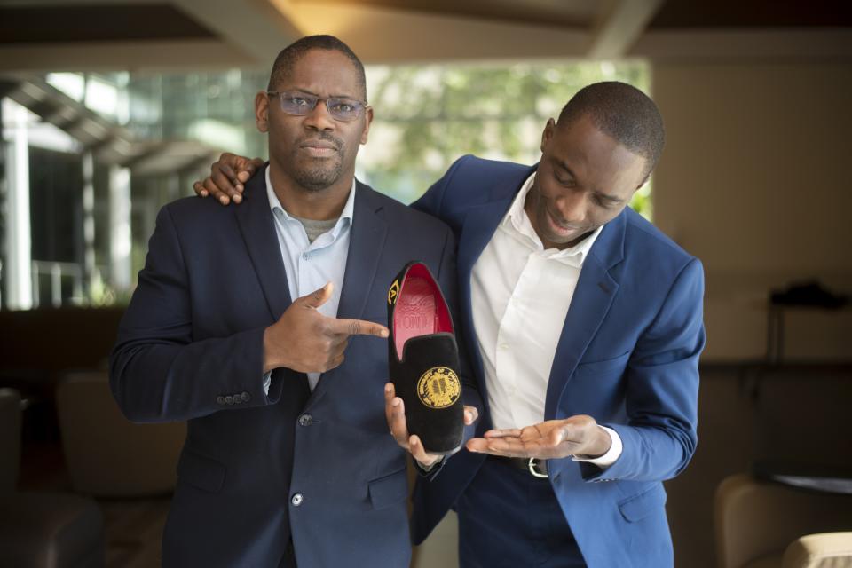 Calvin Ofili and Michael Owolabi display their Big Bang! Business Competition product