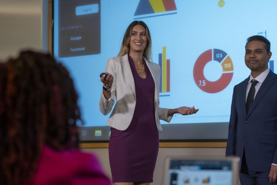 Two people giving a presentation