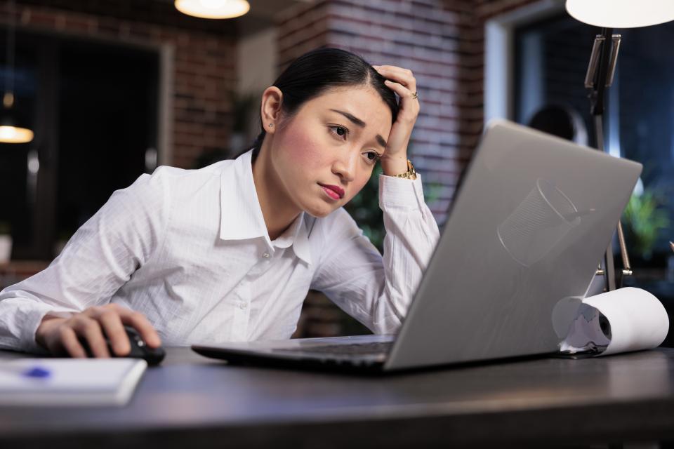 Pay Gender Gap - woman at laptop