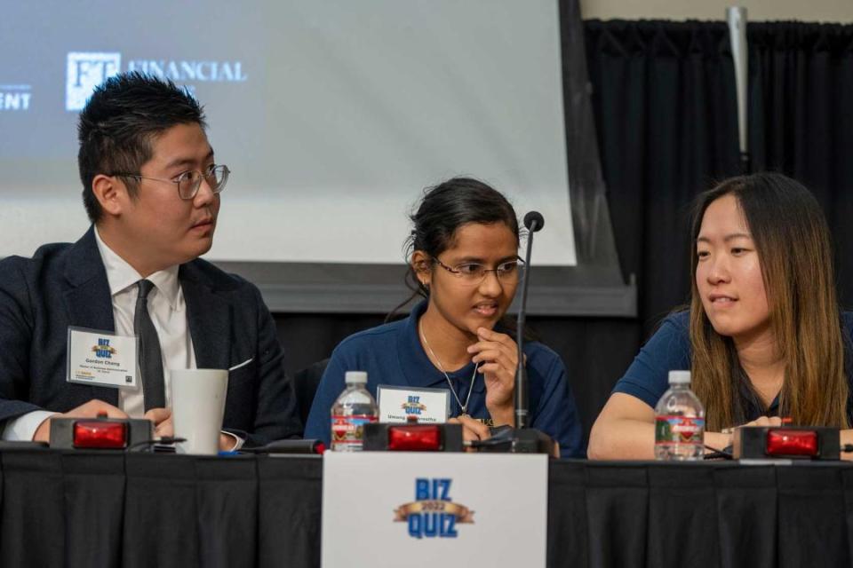 Biz Quiz competitors sitting at a table