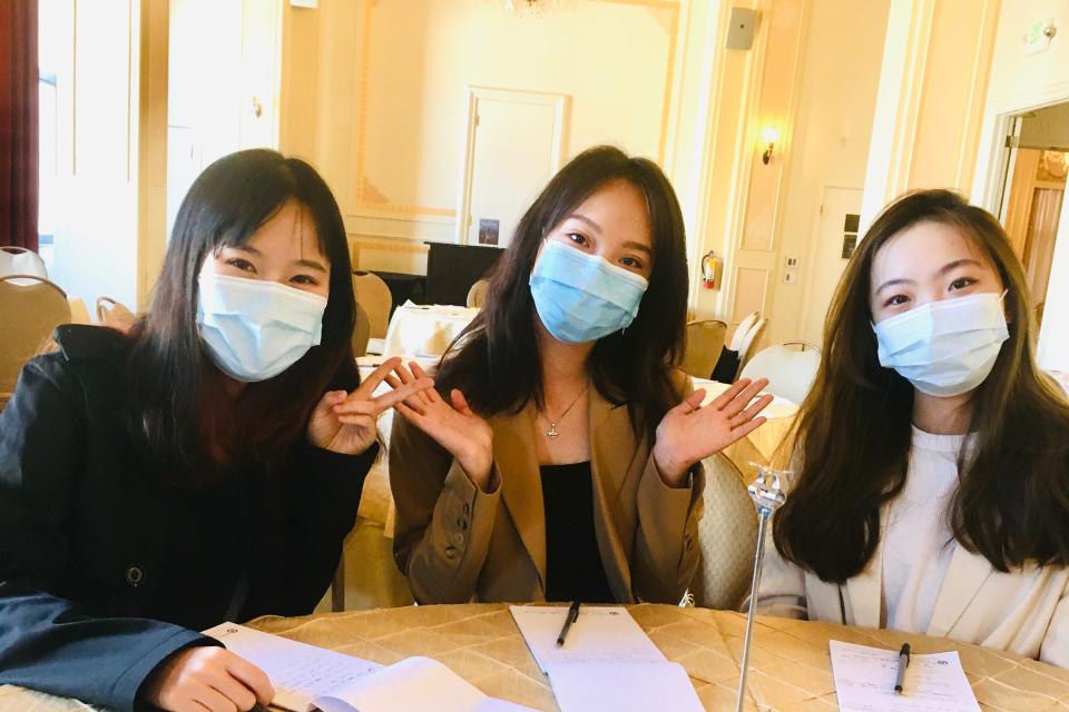 Three women sitting at. a table