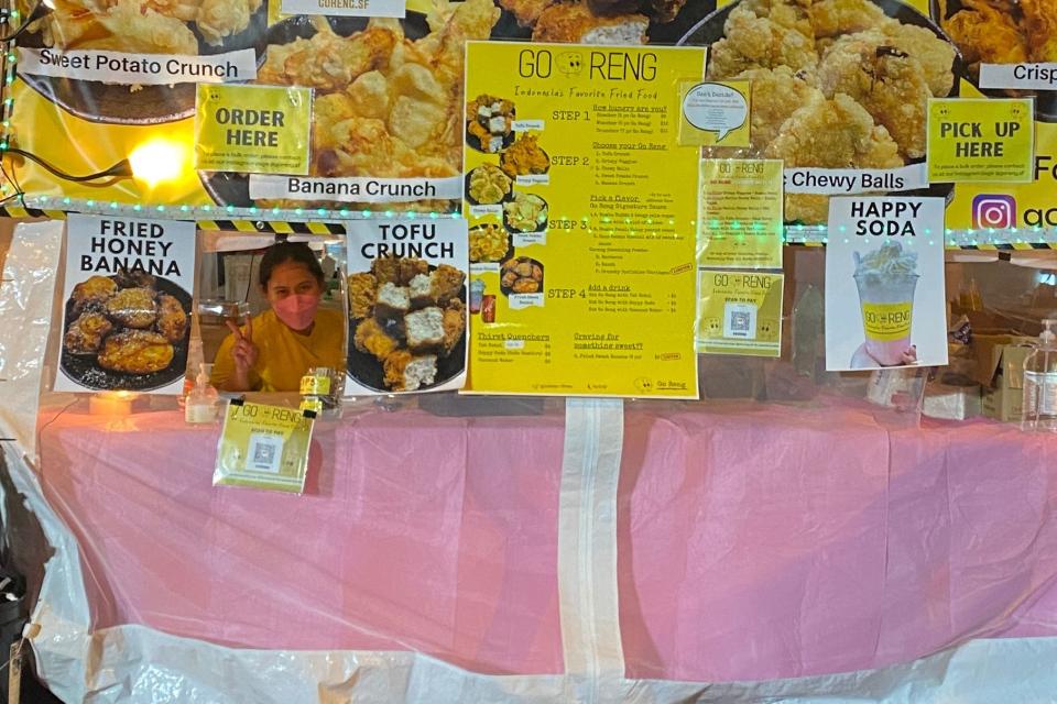 Gracia Liunita in pop-up booth at a food festival