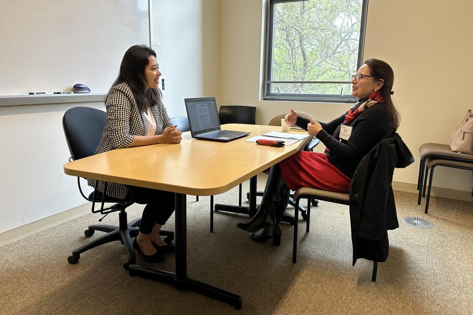 Sraboni Saha and Sunita Dhar in a study room at Gallagher Hall