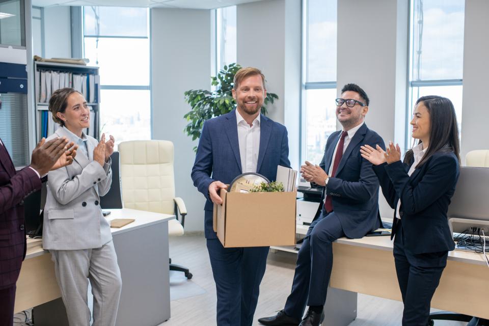 Boomerang employee returns to workplace with box