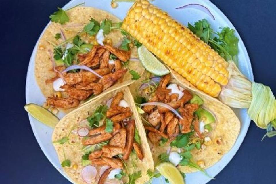 a plate of tacos served with Yeti Food meat alternative 