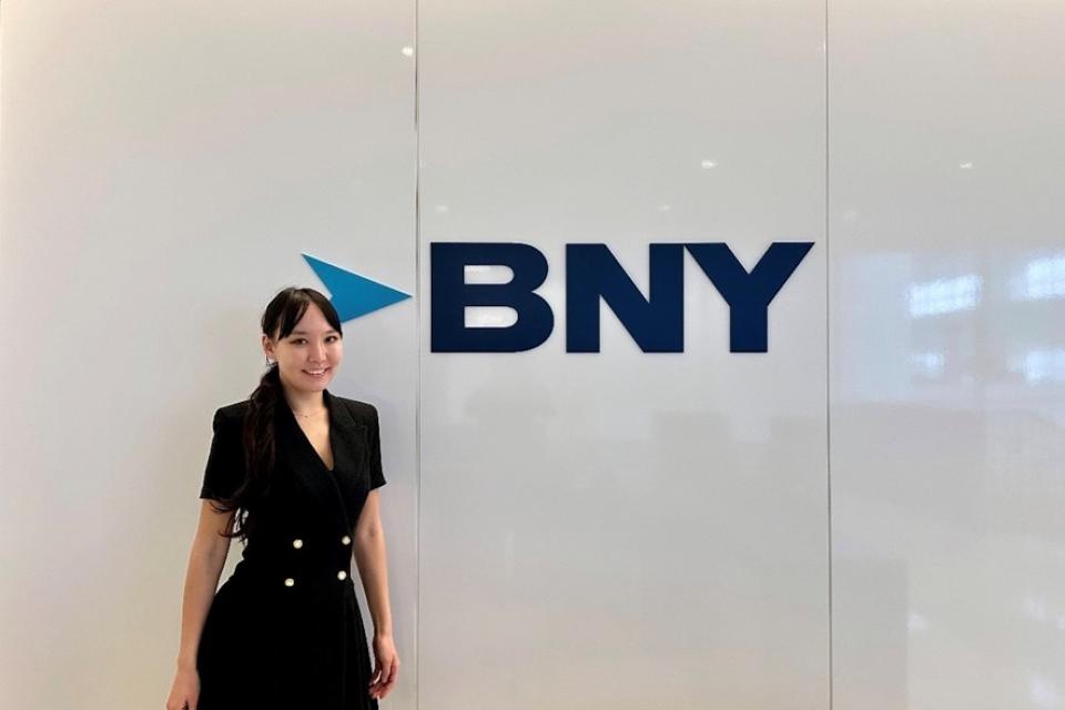 Sodontuya Nerguidavaa next to the BNY logo