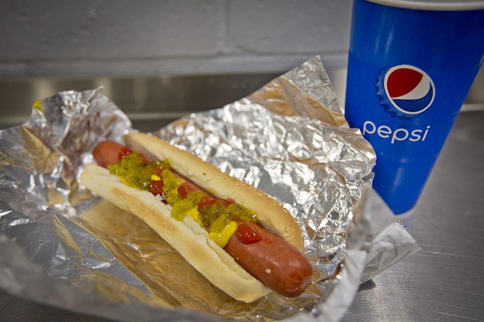 Hot dog with soda